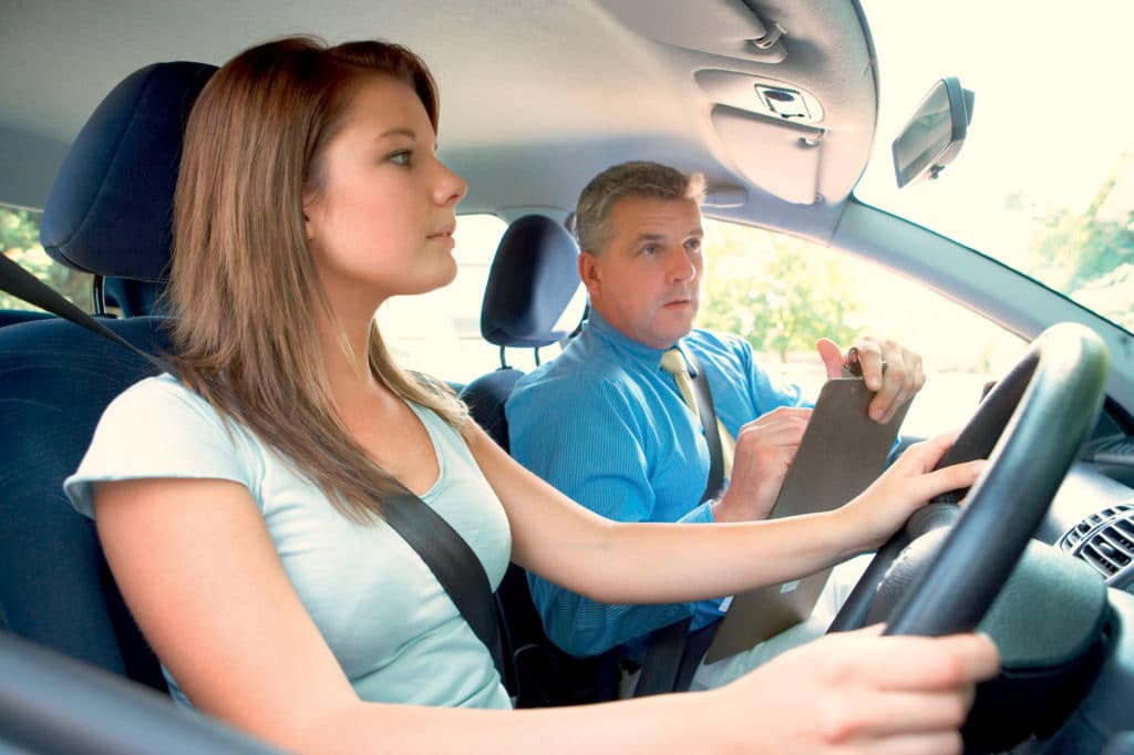 average age of passing driving test uk